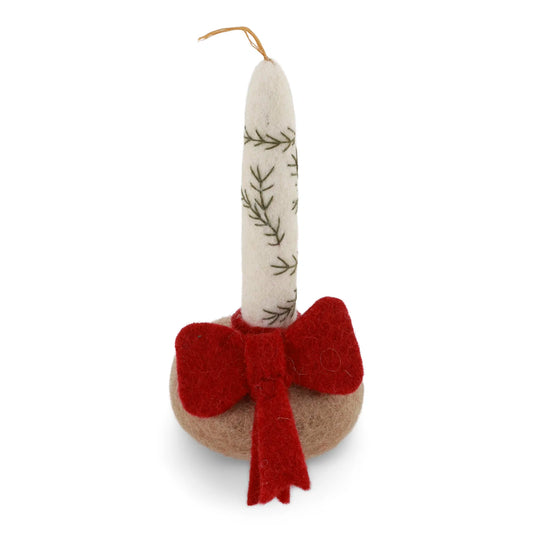 Kandelaar en kaars met rood strikje